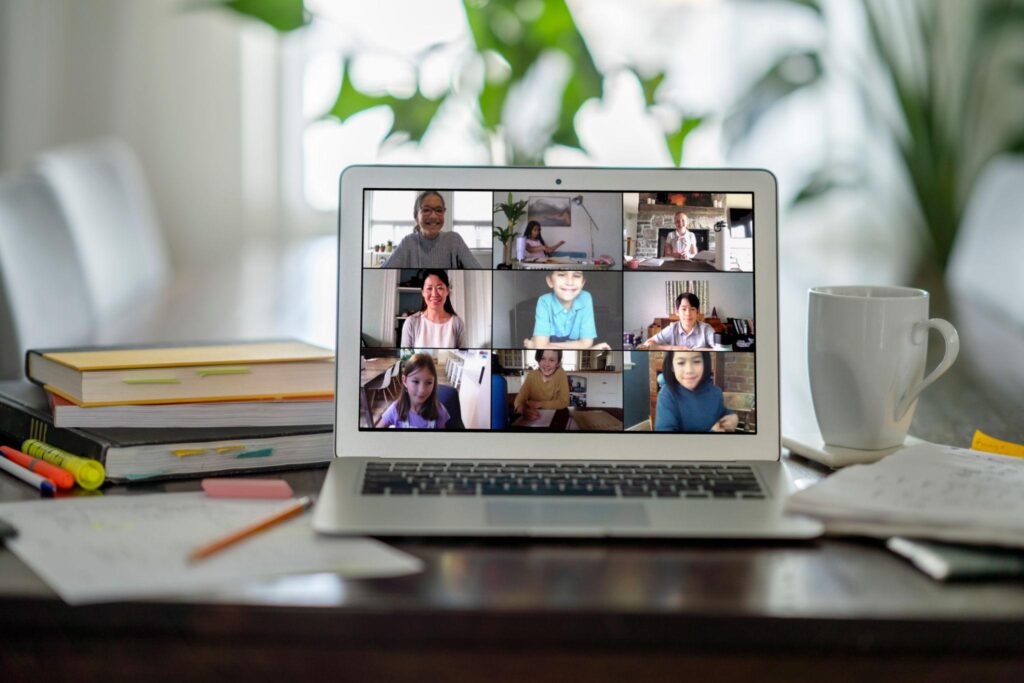 online tutoring side hustle from home for moms teaching students through video calls using a laptop and headset showing how moms can earn income by sharing knowledge and helping others learn remotely