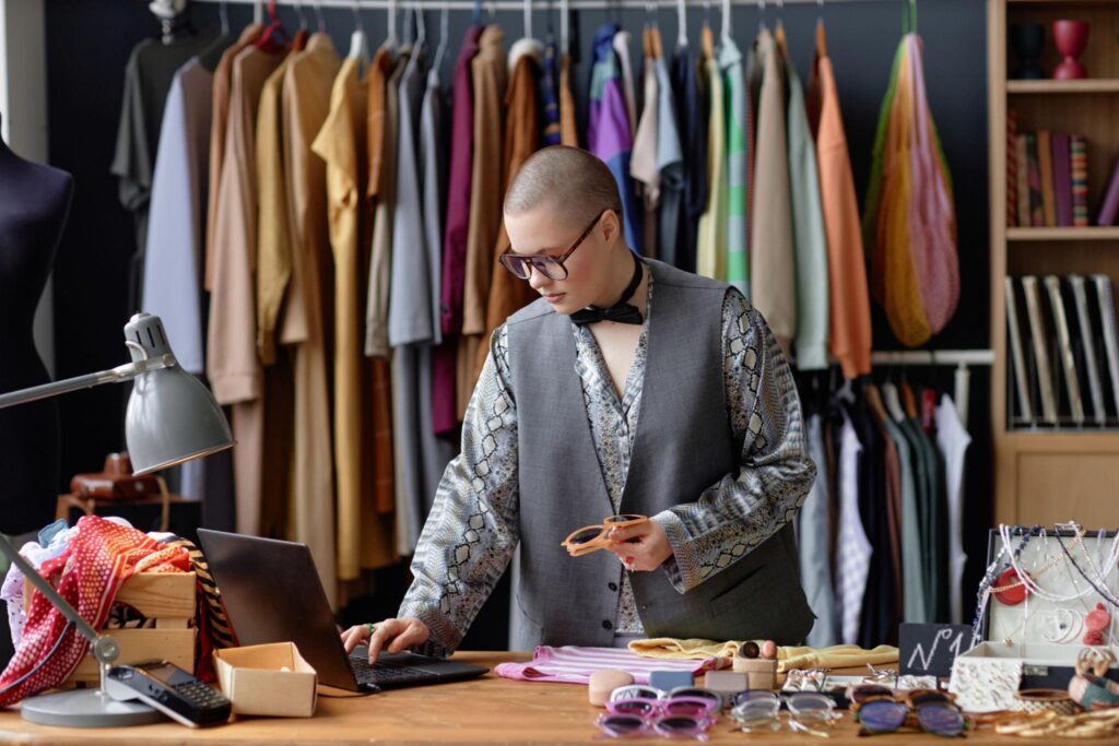 reselling side hustle from home for moms packaging clothes and items to sell online through platforms like ebay and poshmark showing how moms can earn money by flipping products from home