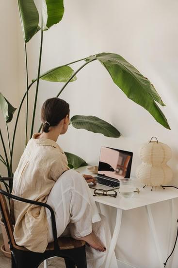selling digital products side hustle from home for moms creating planners templates and downloads on a laptop showing how moms can build passive income streams by designing and selling digital products online