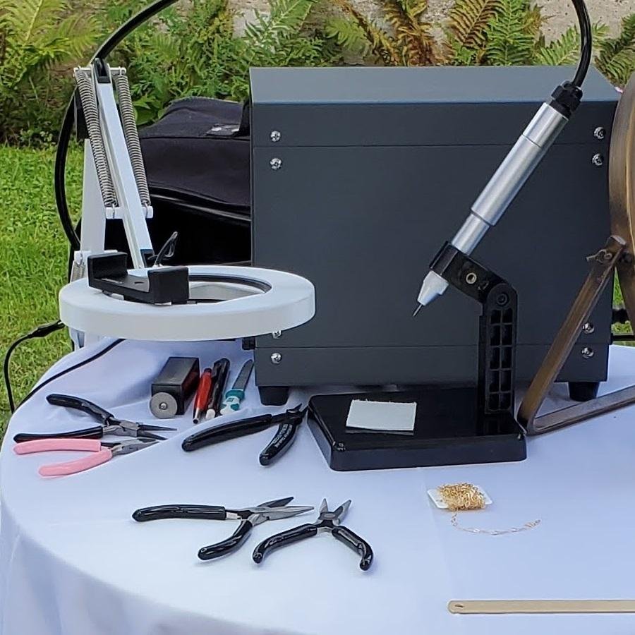 Mobile permanent jewelry business setup checklist with welder chains and tools